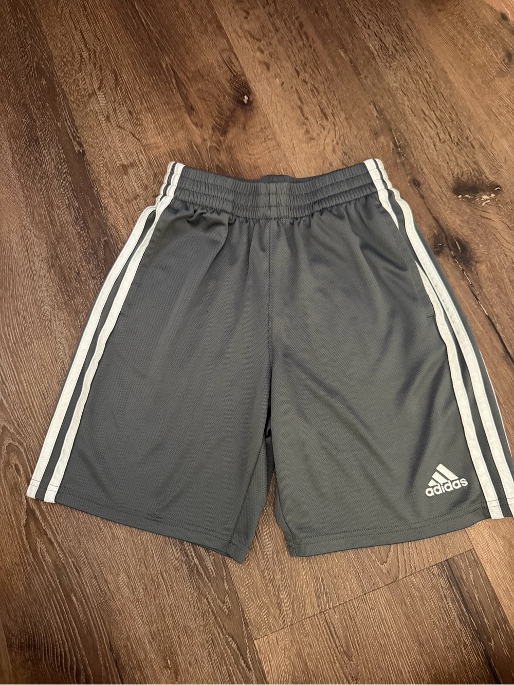 Adidas  boys Gray Athletic Shorts with White Stripes